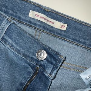 Levi’s Super Skinny Distressed Hem Jeans